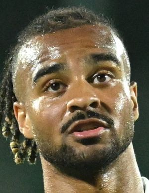 Куми, Джастин