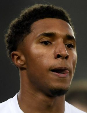 Паттерсон, Трэвис